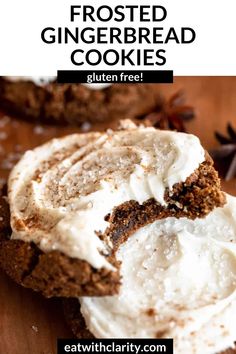 frosted gingerbread cookies on a wooden cutting board