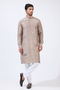 Grey tissue kurta with zari floral and rose motif embroidery. Paired with a cotton silk pant. - Aza Fashions Festive Jamawar Kurta With Gold Embroidery, Jamawar Kurta With Gold Embroidery For Festivals, Gold Traditional Wear Straight Kurta With Floral Embroidery, Embroidered Long Sleeve Tissue Silk Kurta, Straight Kurta With Floral Embroidery In Tissue Silk, Embroidered Straight Kurta In Tissue Silk, Embroidered Tissue Silk Straight Kurta, Traditional Floral Embroidered Kurta For Reception, Festival Cotton Silk Kurta For Reception