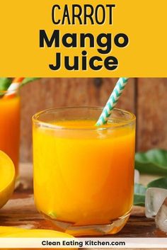 carrot mango juice in a glass with two straws on the side and another orange next to it