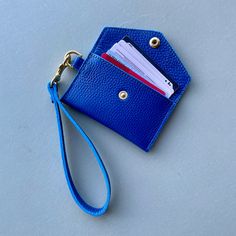 Crafted with premium Italian Pebble Grain Leather, this minimalist envelope wristlet is the perfect accessory for beautiful simplicity. Toss it in a bag or just wear out alone with as a no fuss, classically designed accessory. SHIPS IN 7-10 BUSINESS DAYS SPECS Dimensions: 3”H x 4.5”W Wristlet Strap: 6" opening, 8" including hardware Solid Brass D-Ring, Bolt Snap and Snap closure Lined with Leather Hand Painted edges FABRIC CARE Spot clean. ADDITIONAL FEATURES Holds up to 8 cards Detachable strap Everyday Envelope Card Holder, Elegant Everyday Coin Purse With Cell Phone Pocket, Elegant Rectangular Coin Purse With Wrist Strap, Versatile Wristlet With Card Slots For Daily Use, Versatile Wristlet With Adjustable Strap For Daily Use, Chic Wallet With Wrist Strap For Everyday, Everyday Versatile Wallet With Wrist Strap, Classic Clutch With Wrist Strap For Everyday Use, Versatile Daily-use Wristlet With Card Slots