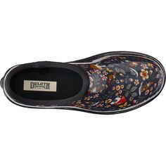 a pair of shoes with floral print on the outs and black rubber outs, side view