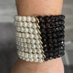 Super Cute And Unique Statement Bracelet. 9 Layers Of Beads Stacked To Create A Sexy Cuff Bracelet. 1/2 In Black Beads 1/2 In Pearl Beads Separate By Gold Detailing On Both Sides Stretches Over Your Hand. Meant To Be Fitted Close To Your Wrist. Black And Pearl Plastic Beading. Nwot- Never Worn. Comes In Original Packaging With Drawstring Bag. Top Rated Seller. Open To Reasonable Offers. Bundle For Discount And To Save On Shipping. As You Know, The Different Computers Display Colors Differently, Adjustable Black Pearl Beaded Bracelets, Black Beaded Pearl Bracelets, Statement Cuff Bracelet, Ying Yang, Statement Bracelet, White Beads, Gold Details, Black Beads, Black Cream