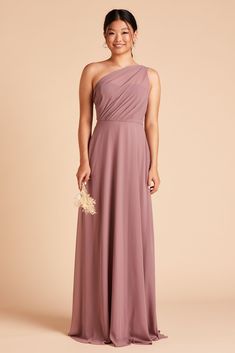 a woman in a one shoulder bridesmaid dress