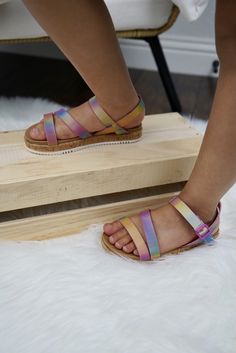 Bring a burst of color and comfort to your kiddo's look with this rainbow sandal! It features an adjustable hook and loop strap with decorative non-functional buckle. Casual Rainbow Open Toe Sandals, Casual Rainbow Sandals, Rainbow Round Toe Synthetic Sandals, Rainbow Open-toe Sandals For Vacation, Bright Sandals, Rainbow Sandals, Secret Sale, Rainbow Kids, Kids Sandals