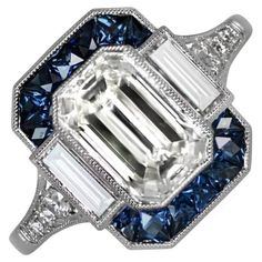 an art deco diamond and blue sapphire ring