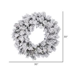 a christmas wreath is shown with measurements