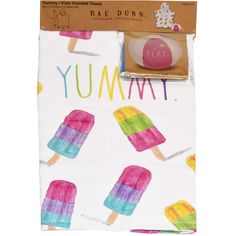 an image of a towel with popsicles on it and the words yummy written in large letters