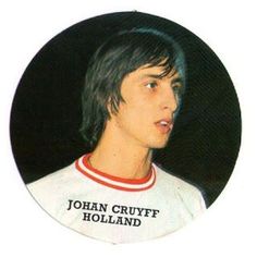 a young man in a white shirt with the name john cruyff holland on it