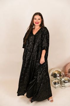 Black Sequin Long Caftan Satin Lined - Fringe+Co Festive Sequined Maxi Kaftan, Festive Sequin Maxi Length Kaftan, Festive Maxi-length Sequined Kaftan, Festive Floor-length Sequined Kaftan, Festive V-neck Sequin Kaftan, Festive Contrast Sequin Maxi Dress, Floor-length Sequin Dress For Festive Occasions, Sequined Long Sleeve Evening Kaftan, Glamorous Sequin Maxi Dress For Fall