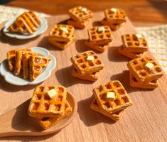 some waffles are sitting on a wooden table