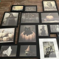 a bunch of pictures hanging up on the wall with pumpkins and ghost's