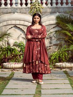 This Set Has a Anarkali, bottom and dupatta. Floral printed Anarkali set with gotta Patti handwork on neck and sleeves paired with matching chanderi foil print dupatta enhanced with fabric detailing and palazzo pants. Color: Brown Fabric: Anarkali - Cotton Silk Bottom - Shantoon Dupatta - Chanderi Product Details: Neck Type - Round neck Anarkali Length - 50 inches Bottom Length - 38-40 inches Sleeve Length - 22 inches Note: Available in other colors The product will be delivered within 2-4 weeks Chanderi Sets With Printed Motifs, Floor-length, Festival Cotton Silk Sharara With Printed Motifs, Festival Sharara With Printed Motifs In Cotton Silk, Designer Cotton Silk Anarkali Set With Printed Motifs, Festive Cotton Silk Sharara With Printed Motifs, Chanderi Anarkali Set With Printed Motifs For Diwali, Festive Printed Motifs Anarkali Set For Diwali, Diwali Chanderi Anarkali Set With Printed Motifs, Festive Anarkali Set With Printed Motifs For Diwali