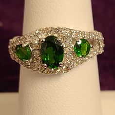 1.25ctw Oval And Round Green Chrome Diopside With .50ctw Round White Zircon Rhodium Over Sterling Silver Ring. Measures Approximately 3/8"L X 1/16"W. Not Sizeable. Accent Stones Primarily Zircon. Size 7. New With Tags Green Chrome, Jtv Jewelry, Womens Jewelry Rings, Sterling Silver Ring, Birthstone, Beautiful Jewelry, Silver Ring, Sterling Silver Rings, Silver Rings