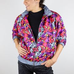 "This is an awesome and funky windbreaker.  It has an amazing 80's vibe pattern and crazy sort of psychedelic design all throughout. It has a very puffy and high-quality feel to it as well. This jacket is ready to party. Order this item today! Condition: In great condition. The elastic on the waist and cuffs are pretty stretched out Features: Zip-up front, front pockets, elastic waist and cuffs, cotton lining Size: Fits like a Ladies Small  22\" shoulders  19.5\" arms 18\" across the bottom unstretched 23.5\" top to bottom length" 80s Vibes, Zip Up, Kimono Top, Casual Button Down Shirt, Elastic Waist, Zip Ups, Men Casual, Jackets & Coats, Adult Outfits