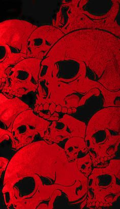 a bunch of skulls that are red and black