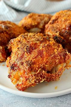 some fried food is on a white plate