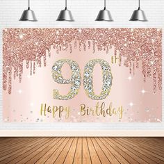 a pink and gold birthday banner with the number 90 on it