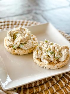 two crackers are sitting on a white plate