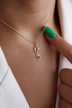 Musical Note Necklace, Treble Clef Pendant, Music Lover Jewelry, Gift for Musicians, Minimalist Design, Silver Charm, Statement Accessory This special necklace is the perfect gift for birthday, anniversary, Christmas, bridesmaid, graduation, wedding, engagement, best friend, girlfriend and boyfriend. MATERIAL * Pendants and Chains are 925 Sterling Silver COLOR * Silver & Gold & Rose Gold GIFT BOX * Each order will come in Jewelry Box. PRODUCTION TIME * 3 - 5 Business Days SHIPPING TIME * 3-5 Bus Couple Pendant Gold, Music-themed Pendant Necklaces As Gift, Music-themed Pendant Necklace As Gift, Music-themed Pendant Necklace, Best Gift For Women, Necklace Couple, Rose Gold Gifts, Mommy Necklace, Lover Jewelry