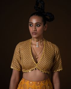 KASUNDI LEHNGA: this lehnga is made in a plush summer silk with 12 kind of flowers printed all over the base, placed in a geometric manner, and is bound with an intricate geometric border. Its hand embroidered in small mirror and sequin embroidery . The blouse is printed in small geometric pattern, then embridered with square shape sequin . Ombre Dupatta is printed and embroidered on borders and has metal coin hanging detail. Fabric : summer silk + organza mustard -olive ombre Color 15 DAYS Deli Small Geometric Pattern, Ombre Dupatta, Small Mirror, Geometric Border, Sequin Embroidery, Have Metal, Small Mirrors, Ombre Color, Sequins Embroidery