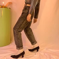 80’s Extreme high waisted black pleated acid washed jeans with leather accent. Button fly. Wide belt loops. 100% cotton. By Los Questa. Sydney is a size s/m, 5’7”. Marked an 11/modern s/m, and fits xs-m depending on desired fit. 29” around waist, 39” around hips, 14.5” rise, 30” inseam. All vintage, second hand and remade items are hand picked for their uniqueness and are one of a kind. The condition is great unless otherwise noted. Because vintage sizing differs from modern sizing, I put the mo Acid Washed Jeans, Shag Jacket, Pleated Jeans, Buckle Pants, Leather Bustier, Tie Waist Pants, Acid Wash Jeans, Wide Belt, Washed Jeans