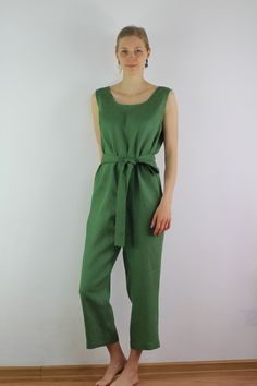 "Linen jumpsuit with belt and 2 pockets in green color, perfect for casual wear and suitable for any occasion in any season Details: - 100% natural linen produced in Europe ; - medium weight (180 gram per square meter); - color: green, could be any from our colors catalog (color samples at the photo); Made to order, approximately a few days, If you have any questions please message me and I will be glad to answer. Size guide : Size XS Bust: fits bust around 33\"-34\"/ 84-88 cm Waist: fits waist Green Linen Jumpsuits And Rompers For Spring, Casual Green Linen Jumpsuits And Rompers, Linen Overall Jumpsuit With Pockets, Green Linen Jumpsuit, Spring Linen V-neck Jumpsuit, Womens Summer Jumpsuits, Linen Casual Dress, Overall Jumpsuit, Jumpsuit Casual