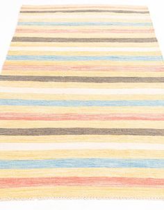 multicolored striped rug on white background