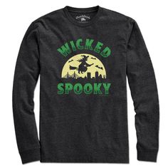 Wicked Spooky Witch Skyline T-Shirt Who's read to get Wicked Spooky this Halloween? If you're reading this right now, clearly it's you. If you're looking for the perfect t-shirt to show off your Halloween spirit and/or general witchiness, look no further than this design. Featuring a spooky witch and bats flying over that instantly-recognizable Boston skyline, this tee is a must-have addition to your October attire. The word wicked goes hand-in-hand with Boston AND witches, so be ready for a tru Spooky Long Sleeve Screen Print T-shirt, Spooky Long Sleeve T-shirt With Screen Print, Bats Flying, Bat Flying, Boston Skyline, Spooky Witch, Halloween Spirit, Charcoal Color, Spirit Halloween