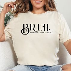 BRUH Formerly Known as Mom Shirt Funny Mom Life Sweatshirt, Gift for Mom, Boy Mom, Mom Mommy Bruh, Mothers Day Gift, Mama Shirt, Sarcastic Bruh Shirt If a mistake is made during ordering with shirt size or color, please message me right away. I can adjust the order as long as it has not begun production. ✧✧ About our T-shirt ✧✧  ✦  Soft cotton and quality print. ✦  Ribbed knit collars to bolster shaping. ✦  Tapered shoulders for a better fit over time.  ✦  Dual side seams to hold the garment's shape for longer period of time.  ✧✧ Care Instructions ✧✧ ✦  Machine wash cold, inside-out, gentle cycle with mild detergent and similar colors.  ✦  Tumble dry low, or hang-dry for longest life. ✦  Cool iron inside-out if necessary. Do not iron decoration. ✧✧RETURNS/EXCHANGES✧✧ ✦ For any problem or c Boy Mom Shirt Bruh, Mom Mommy Bruh, Bruh Shirt, Mama Shirts, Funny Mom Shirts, Funny Mom, Boy Mom, Mama Shirt, Mom Humor