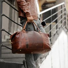 This Large Duffel Bag is a premium Leather Luggage piece designed for men, perfect for weekend getaways or overnight trips. As a stylish and durable Travel Bag, it serves as a versatile Leather Holdall Bag combining function and luxury. This makes it an ideal Gift Idea for Husband, offering both elegance and practicality in a Luxury Luggage item. DETAILS: Vegetable tanned Genuine Leather Large opening zip around main compartment Fully lined jacquard interior Internal pockets Small Front Zipped P Leather-lined Weekender Bag For Everyday Use, Brown Luggage With Sleeve For Weekend Trips, Brown Luggage For Weekend Trips With Sleeve, Brown Business Duffle Bag, Leather Weekender Bag For Travel, Brown Luggage With Leather Handles For Overnight Trips, Brown Leather Luggage For Overnight Trips, Luggage With Sleeve For Overnight Trips, Large Capacity Luggage For Everyday Use