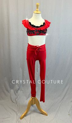 Red camisole bra top has Red ruffle along neckline and on straps. Black appliques on front of chest and Black ruffle peeking out of neckline. Paired with Red leggings with tie front waistband. 5.5 Gross of Jet Hematite 9ss, 12ss, 16ss, 20ss and 30ss Rhinestones! **Costume in image is a YM, Photographed on a YM/YL Mannequin with Measurements of: Bust 27", Waist 24", Hip 27", Girth 47" Trio Costumes, Sequin Jewelry, Red Camisole, Costumes Couture, Black Ruffle Top, Camisole Bra, Red Leggings, Sequin Appliques, Tutu Costumes