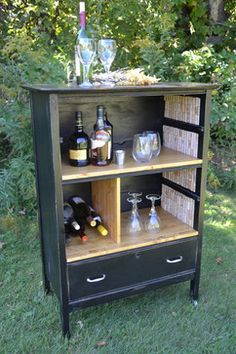 an old dresser turned into a liquor cabinet