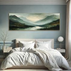 a bedroom with a large painting on the wall above the bed and white linens