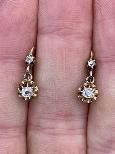 CLASSIC French Victorian diamond dormeuse (Sleeper) earrings with a secure 18k yellow gold lever back closure. There is an old cut approx. 2.2mm diamond in a prong setting on top .03ct. = .06ct. Not great quality The bottom diamonds cushion shaped old Mine Cut (thicker and small table)  cut 3.2x3.4 mm approx .21ct. each = .42ct. bottom diamonds clean white and sparkly Total estimated diamond weight .48ct. or just under 1/2ct.  The snap lever backs are stamped with French hallmarks and in good wo Victorian Yellow Gold Dangle Earrings, Victorian Yellow Gold Earrings With Screw Back, Victorian Yellow Gold Diamond Earrings With Rose Cut, Vintage Yellow Gold Diamond Earrings With Rose Cut, Victorian Gold Screw Back Earrings, Victorian Gold Earrings With Screw Back, Vintage Yellow Gold Round Diamond Earrings, Antique Gold Screw Back Earrings, Antique Gold Earrings With Screw Back