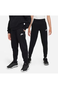 An embroidered Swoosh marks one pocket of these kid-size joggers that will keep them cozy from the classroom to the playground and back. 80% cotton, 20% polyester Machine wash, tumble dry Imported Nike Casual Joggers For Training, Casual Nike Joggers For Training, Cotton Sportswear Joggers For Training, Cotton Joggers For Training, Casual Sweatpants With Side Pockets For Training, Black Cotton Training Joggers, Black Cotton Joggers For Training, Black Cotton Sweatpants For Training, Nike Cotton Training Bottoms