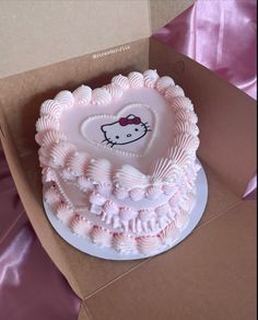 a hello kitty birthday cake in a box