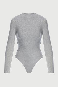 The power of a perfect basic. Constructed from our signature fabrication, our classic bodysuit molds to your frame with a second-skin fit, mock neckline, long fitted sleeves, and thong back with baby snap closure down below. A versatile piece that can be dressed up or down. NW Collection Legacy Collection Import 95% Viscose, 5% Spandex Model wears size X-Small True to size Double-lined All Bodysuits Are Final Sale Mock Neck Bodysuit, Fitted Sleeves, Swim Shop, Mock Neckline, Womens Bodysuit, Dress Jewelry, Night Looks, Caicos Islands, Fit Style