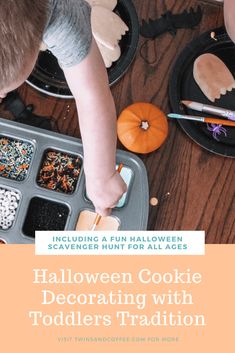 a young boy is decorating his halloween cookies with toddler's tratton