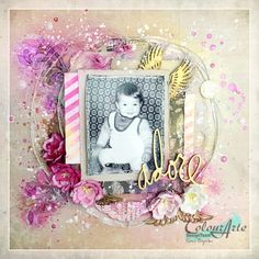 a scrapbook page with an image of a baby in the center and flowers around it