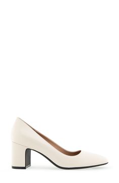 An almond toe defines this classic leather pump elevated by a half-moon block heel and a shock-absorbing sole. Leather upper/synthetic lining and sole Imported Semi-formal Loafers With Almond Toe And Branded Insole, Cream High Heel Block Heels For Work, Cream Heels With Reinforced Heel For Workwear, Cream Court Shoes With Padded Heel And Medium Width, Modern Almond Toe Heels With Rubber Heel Cap, Classic Pump With Padded Heel And Round Toe, Classic Pumps With Padded Heel And Round Toe, Round Toe Pumps With Branded Heel Counter, Cream Court Shoes With Sculpted Heel For Work