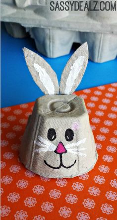 an egg carton bunny made out of fabric