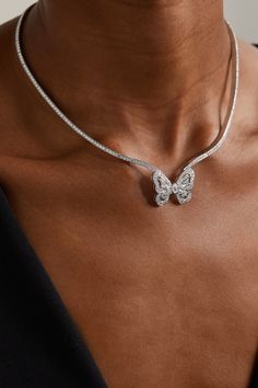 Enchanting and delicate, De Beers' 'Butterfly' necklace is part of the 'Portraits of Nature' collection. The structured 18-karat white gold chain holds the mystical insect perfectly at the crook of your neck and is liberally sprinkled with G+ VS+ diamonds. Each stone has been selected by eye before being cut and polished by world-renowned diamantaires to enhance its natural brilliance. Elegant White Gold Jewelry With Butterfly Charm, Butterfly-shaped White Gold Jewelry For Wedding, Luxury Sterling Silver Butterfly Necklace, Luxury White Gold Butterfly Pendant Necklace, White Gold Butterfly Jewelry For Wedding, Luxury Silver Butterfly Necklace, Luxury Diamond Butterfly Necklaces, Luxury Diamond Jewelry With Butterfly Charm, Formal Butterfly Pendant Necklace In Fine Jewelry Style