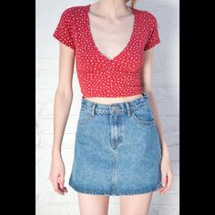 Cotton Blend Crossover V-Neck Short Sleeve Top In Red With White Floral Print A Cropped Fit And Seam Under The Bust. Fabrics: 96% Cotton, 4% Elastane Measurements: 14" Length, 13" Bust Made In: Italy Red Fitted V-neck Top, Fitted V-neck Crop Top In Casual Style, Spring Casual Low-cut Crop Top, Casual Low-cut Crop Top For Spring, Fitted Short Sleeve V-neck Top, Red Fitted Crop Top With Short Sleeves, Fitted Red Crop Top With Short Sleeves, Trendy Fitted Long Sleeve V-neck Top, Red Crop Top For Summer