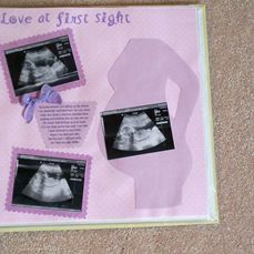 a baby's first sight is displayed on a pink card with pictures and words