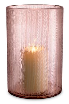 a pink glass candle holder on a white background