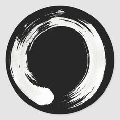 a black and white circle with the letter o in it