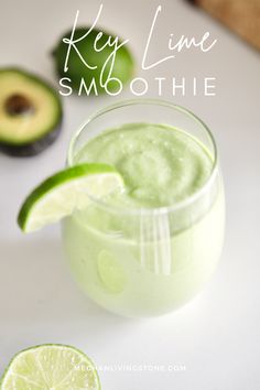 an avocado and lime smoothie in a glass with the text key lime smoothie