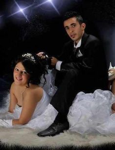 a bride and groom posing for a photo in their wedding gowns with stars above them