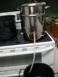 pots and pans are sitting on top of the stove