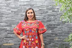 "This is a short sleeve casual shirt for women. It is covered with beautiful hand embroidered flowers in all colors. It has a comfortable scoop neck and is made of cotton. You will love wearing this unique well made blouse with your favorite skirt. This shirt measures 22\" wide x 27\" long. It has 8\" sleeve openings and a 10\" opening for the neck. Size Large About Our Items: Each one of our items is handmade/hand woven by Indigenous communities of Chiapas and Oaxaca in Mexico. Great care has b Cheap Tops With Multicolor Machine Embroidery, Cheap Multicolored Embroidered Cotton Top, Cheap Multicolor Cotton Embroidered Top, Affordable Multicolor Embroidered Blouse, Cheap Fitted Blouse With Multicolor Embroidery, Cheap Multicolor Embroidered Blouse For Spring, Cheap Multicolor Embroidered Top For Women, Mexican Blouse, Hand Embroidered Flowers